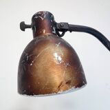 Industrial in height to be adjusted vintage clamp lamp from the 1970s