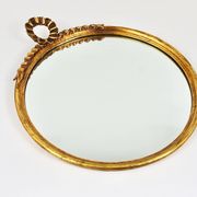 Round wall mirror in gilded wood, mid-century, C. Allodi & G. Subelli, Italy, 1950s.