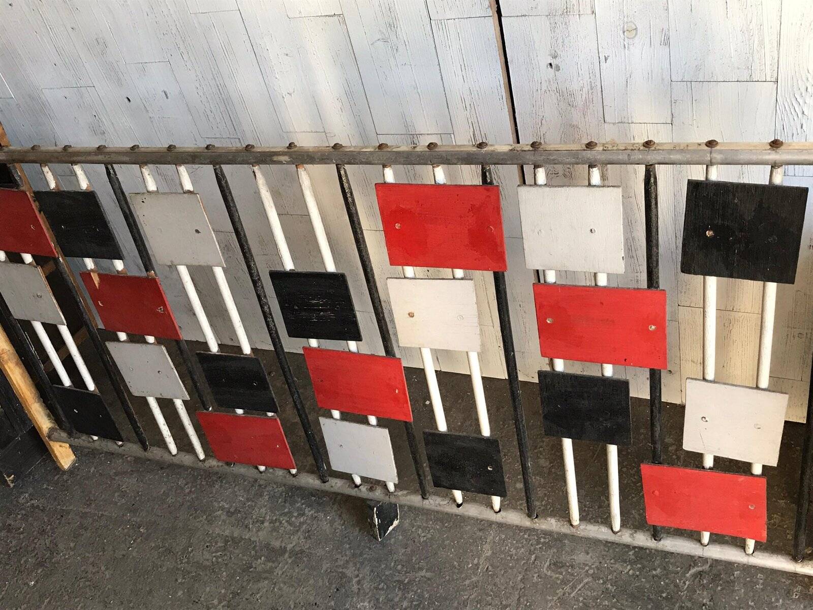 Large vintage 1960s multicoloured wall shelf system made of wood and aluminium.