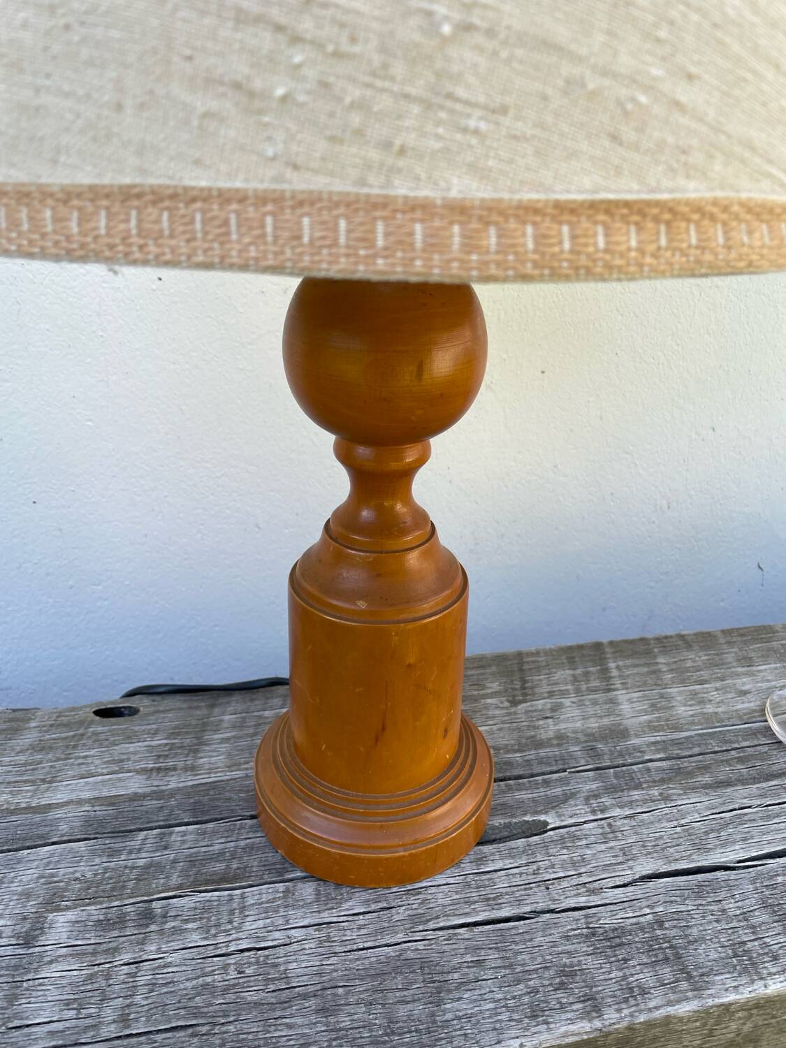 Old turned wooden lamp