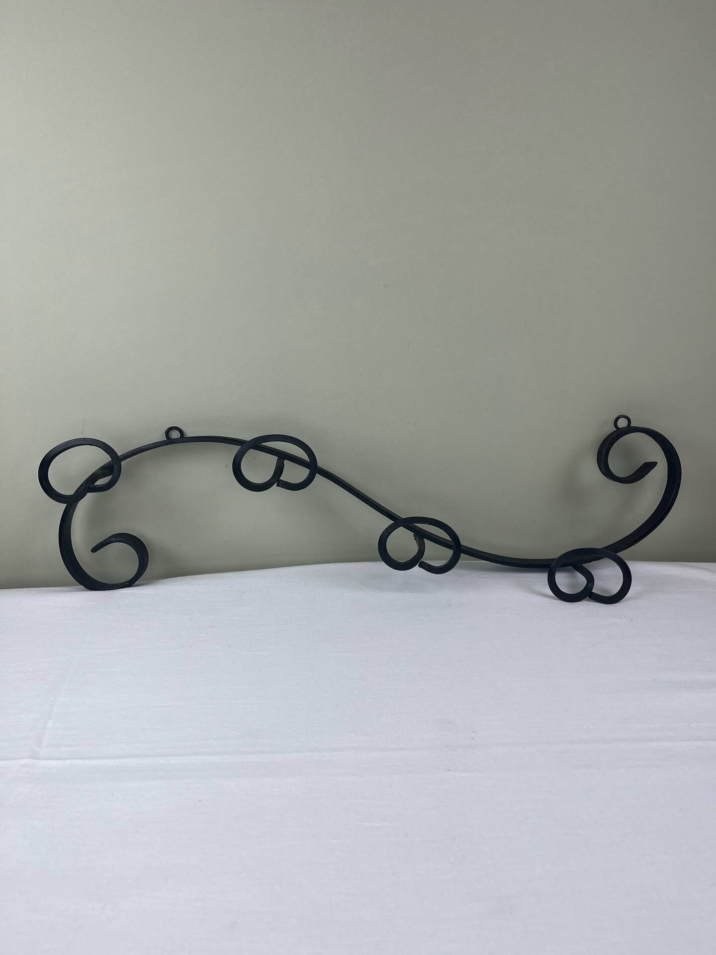 Wrought iron coat rack