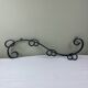 Wrought iron coat rack
