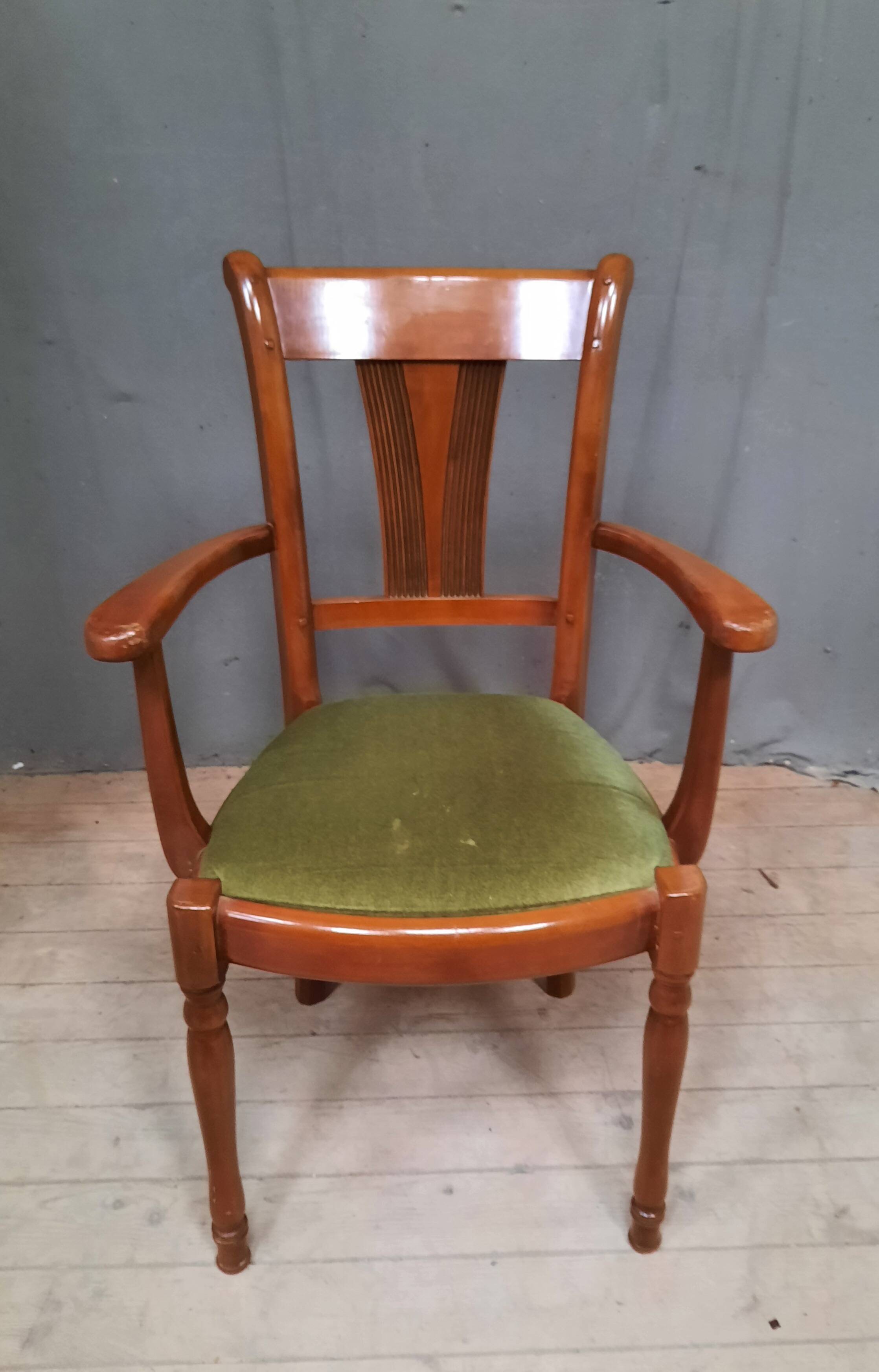 Modern armchair in varnished wood