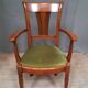 Modern armchair in varnished wood