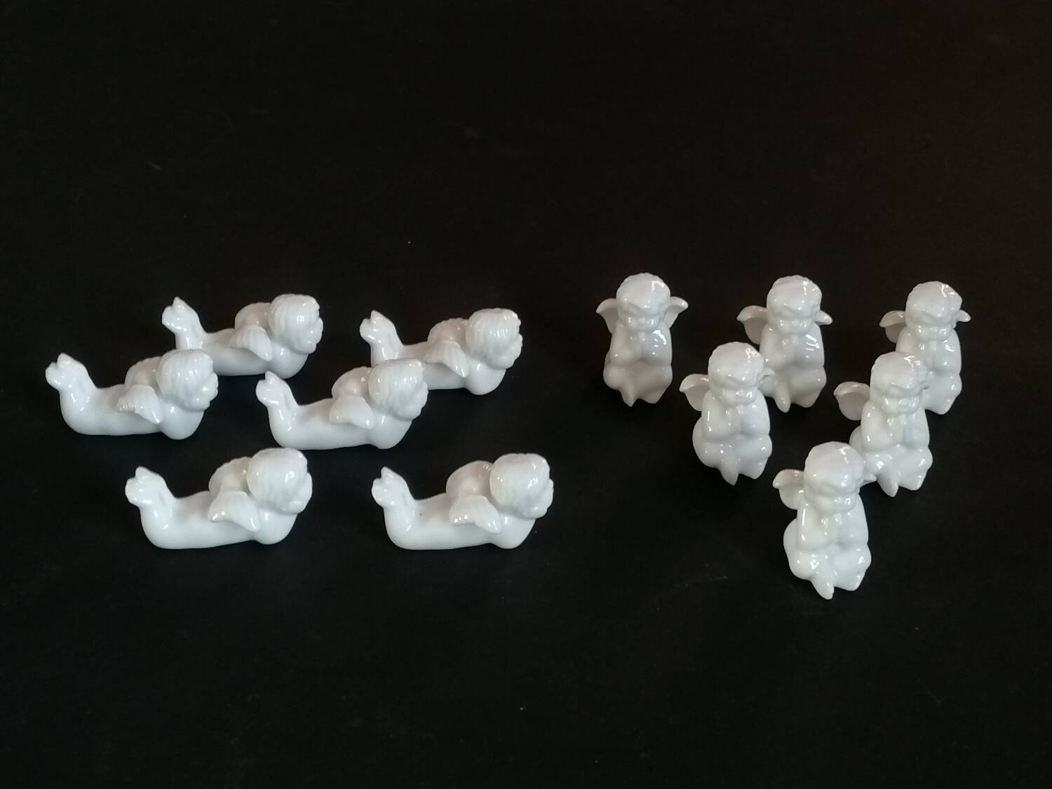 Lot 6 knife holders and 6 porcelain place markers putti angels