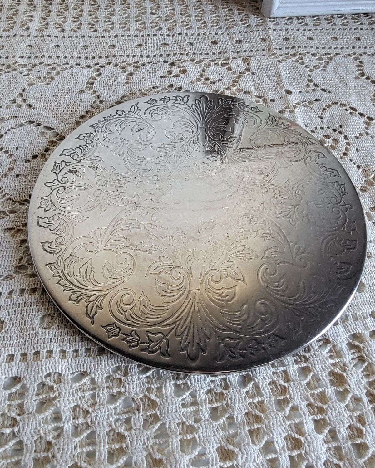 Silver-plated metal trivet English