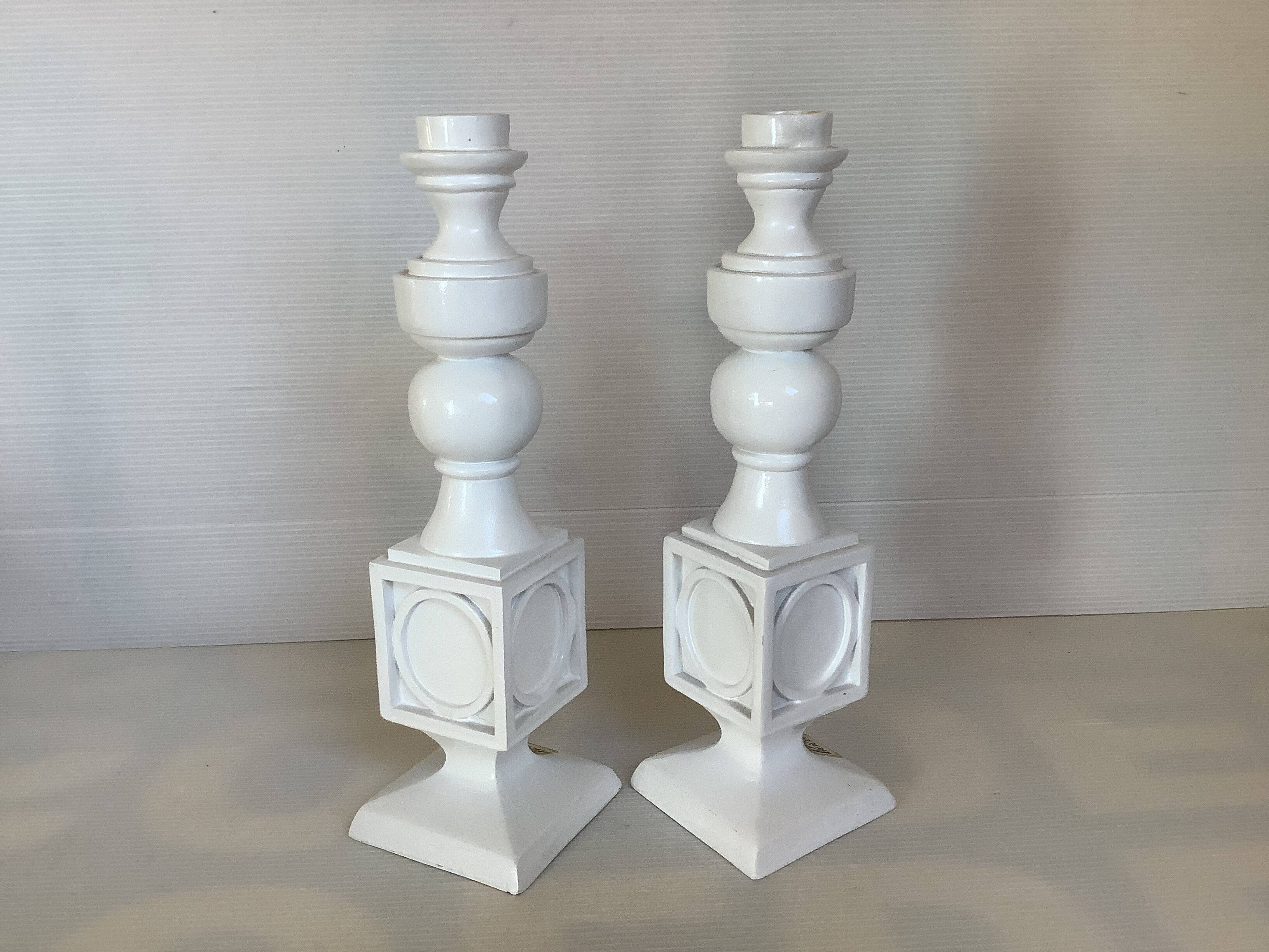 Pair of white resin candle holders