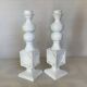 Pair of white resin candle holders