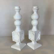 Pair of white resin candle holders