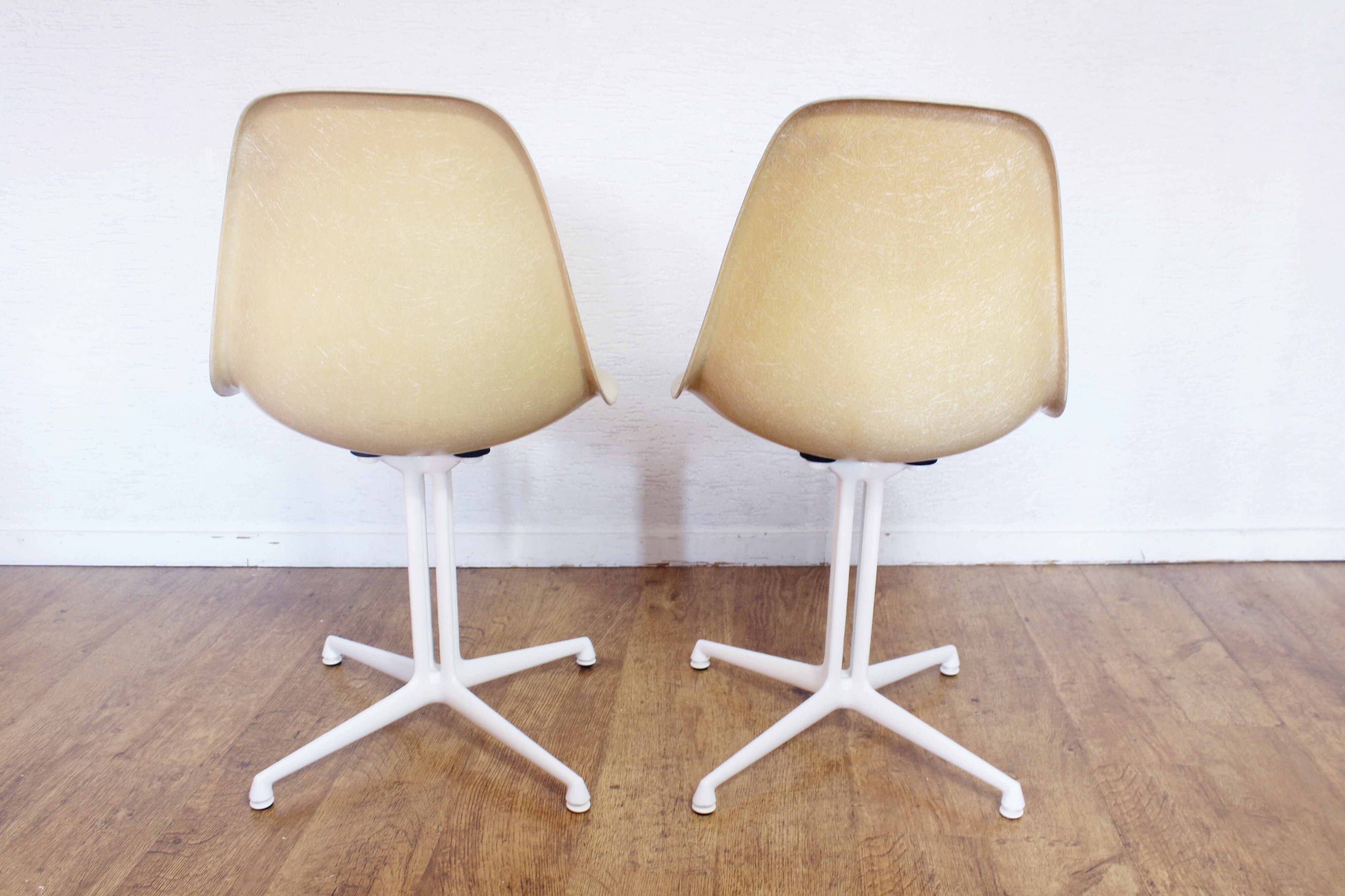 Pair of EAMES La Fonda fiberglass chairs 1970
