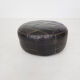 Mid-century round leather ottoman