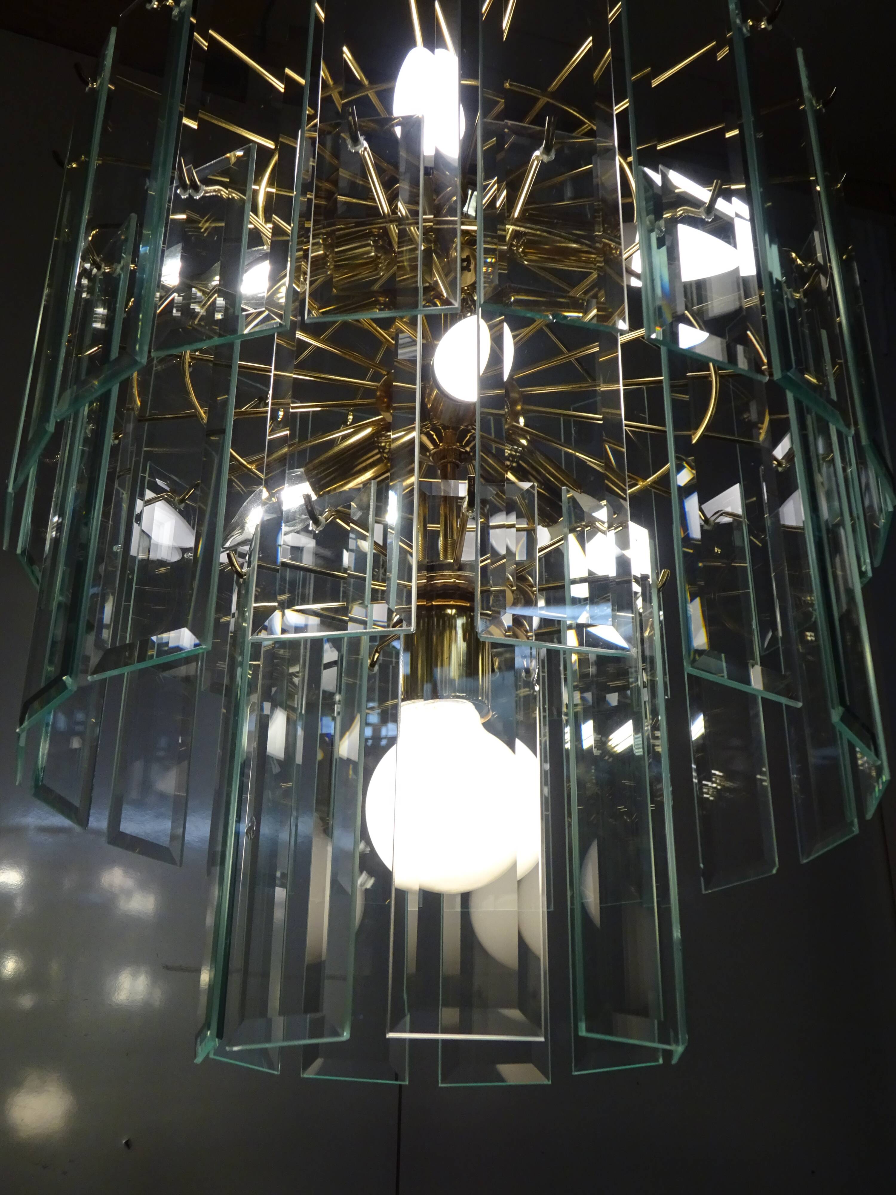 Brass chandelier and beveled glass, Italian manufacturing