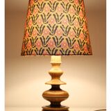 Turned wooden base lamp with printed lampshade
