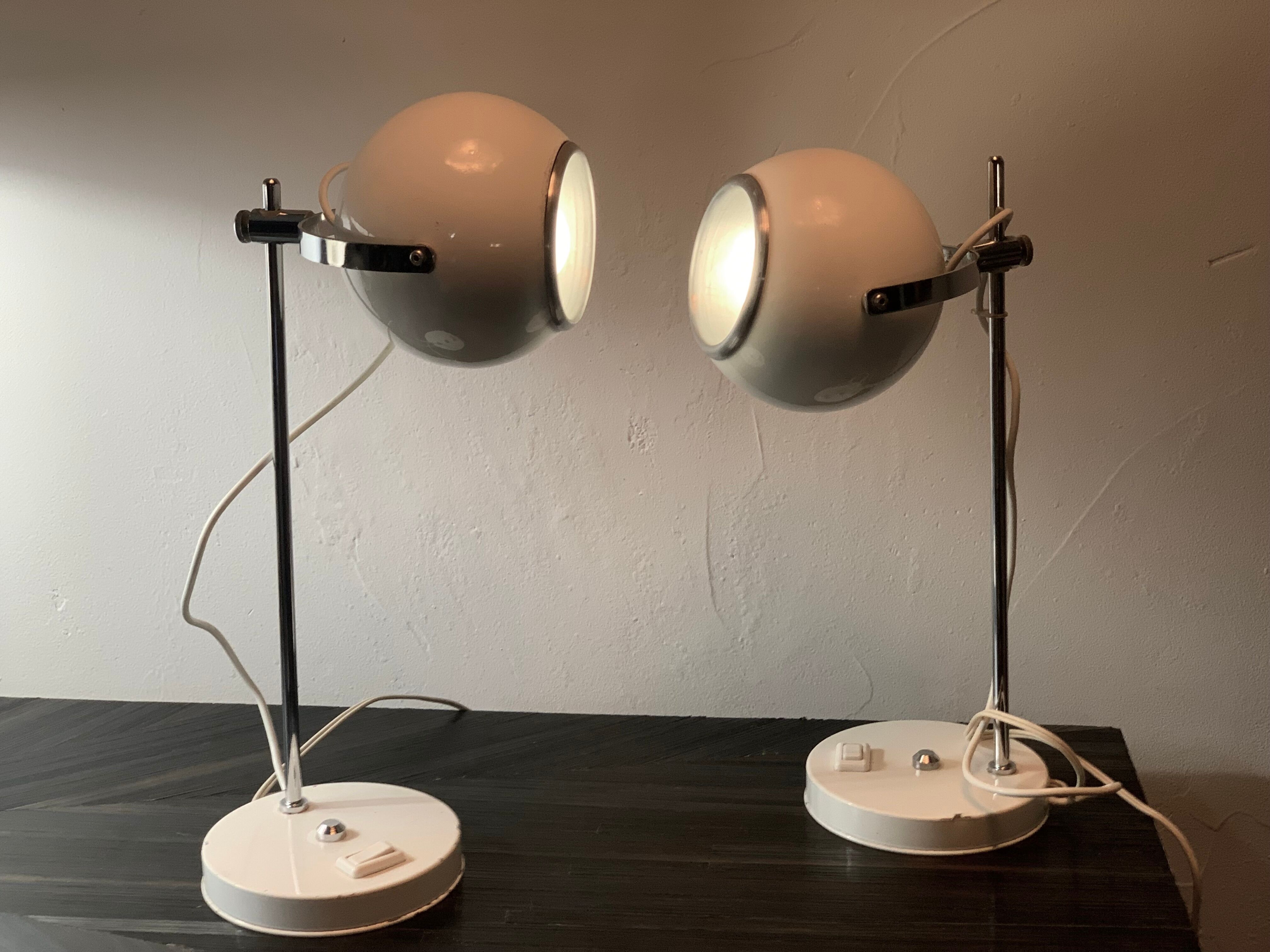 Duo of Delmas house Eyeball lamps