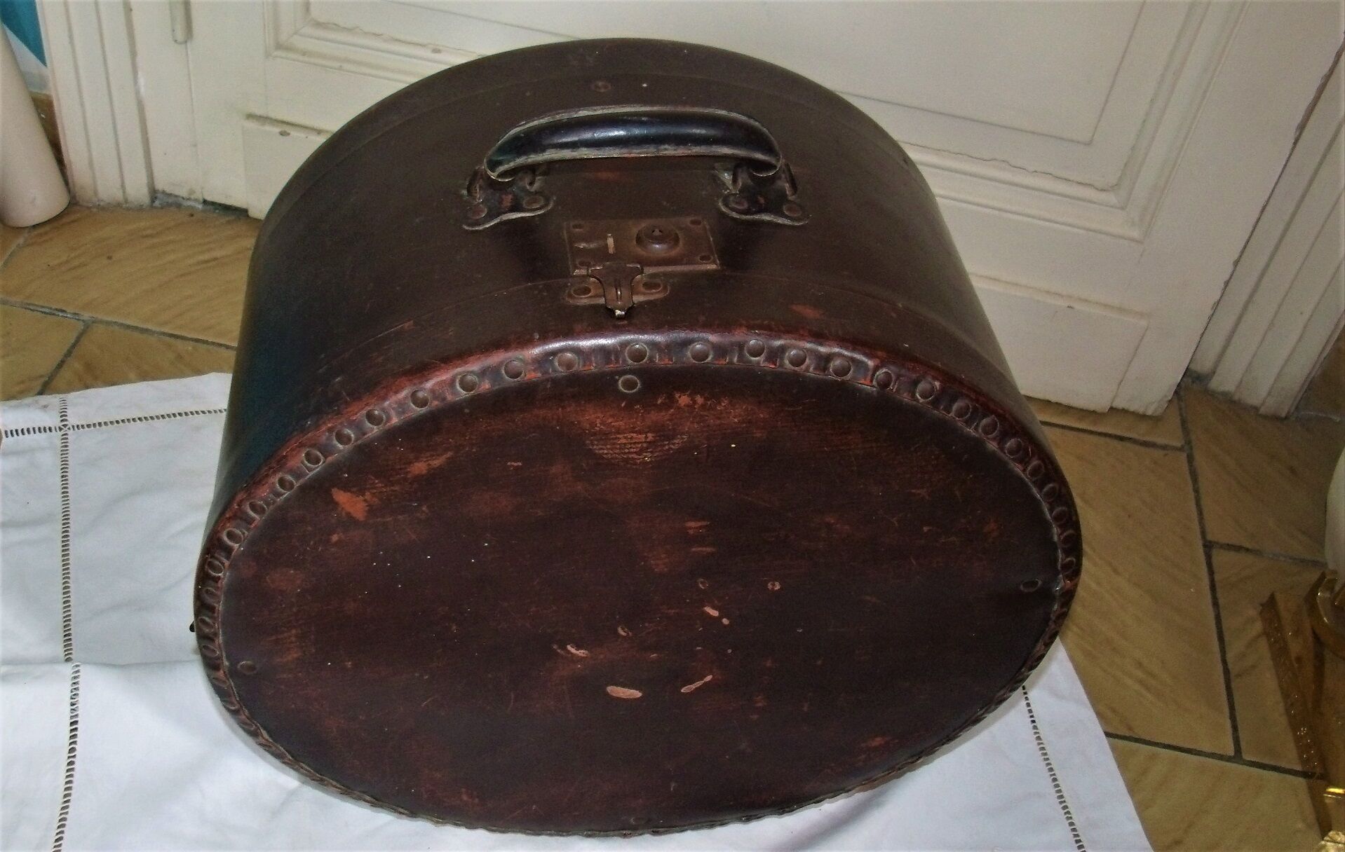 Studded old leather hat box