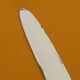 Set of 12 cheese or fruit knives handle in silver metal.