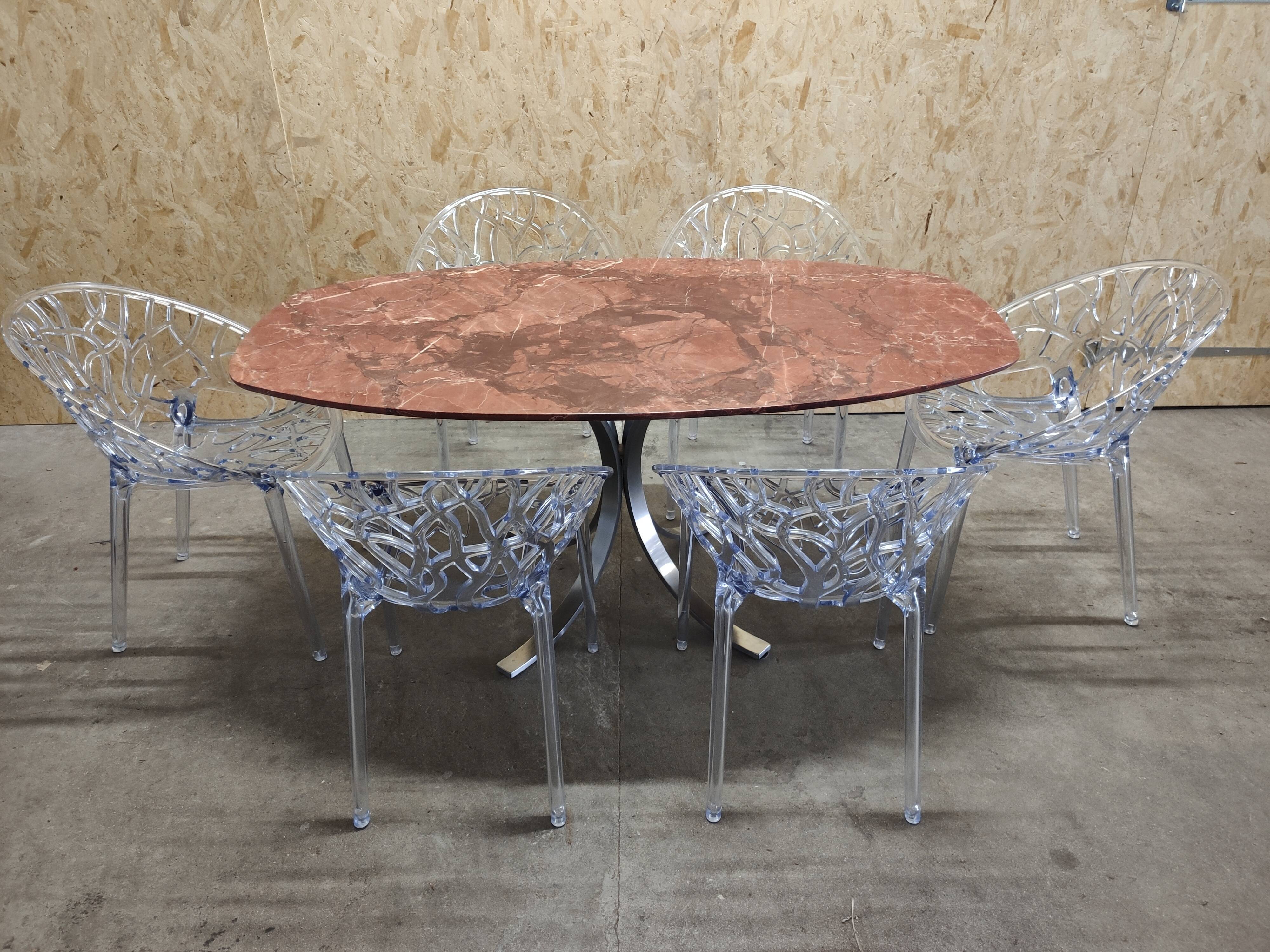 Oval dining table in red marble alicante techno