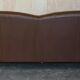 Contemporary Howard & Sons style grand sofa with brass casters.