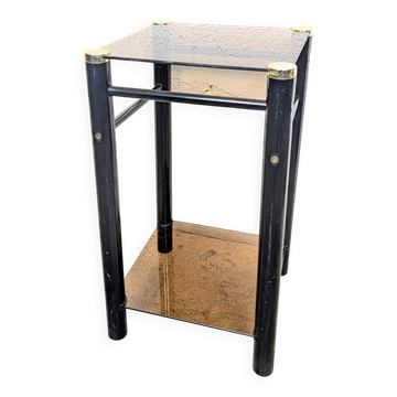 Vintage side table with two smoked glass tops and black metal.