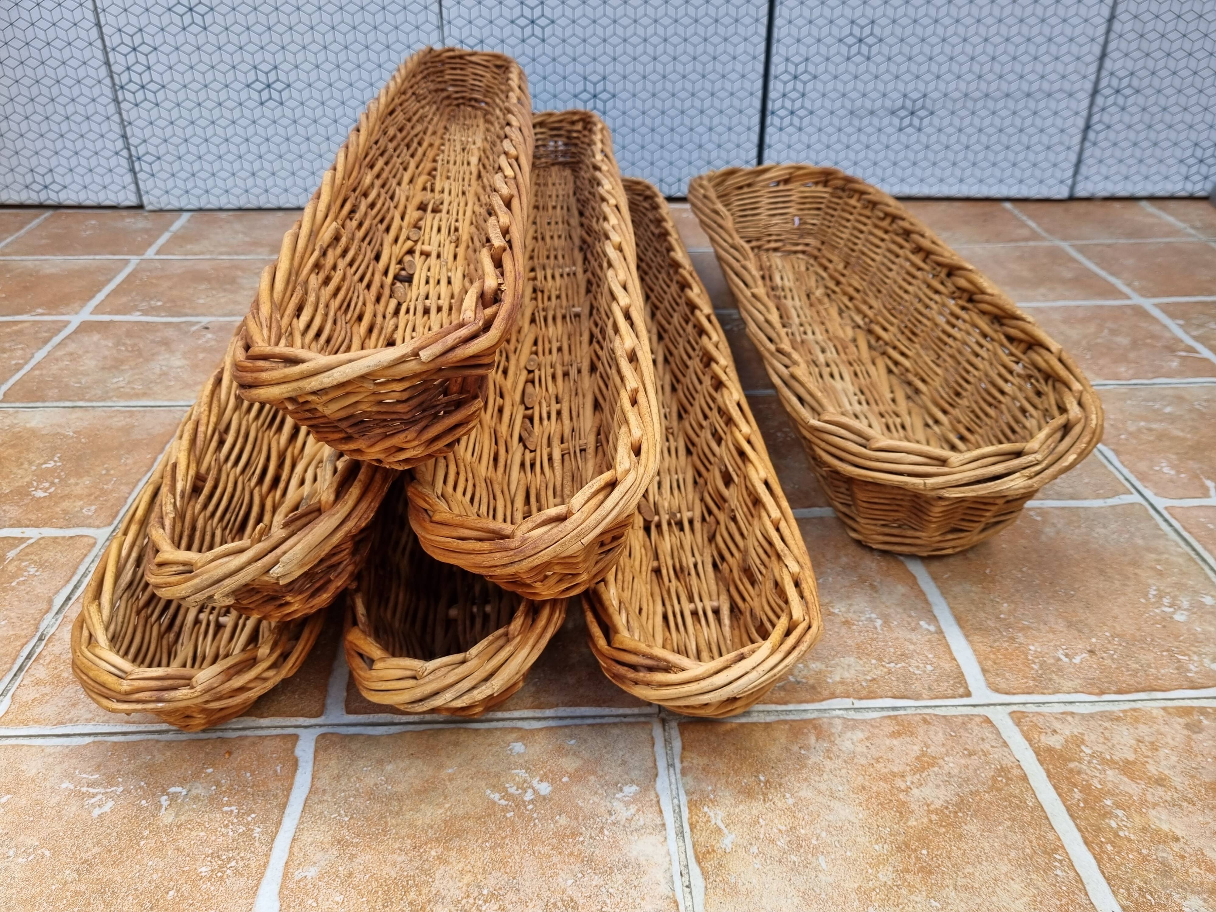 Set of 7 wicker baker's baskets, 1960s