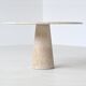 Large sculptural round dining table in cream white travertine, Italy, 1970.