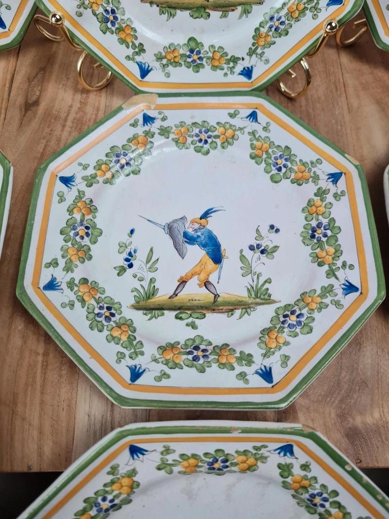 Set of 12 small antique plates by Alfred Renoleau, different designs.