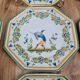 Set of 12 small antique plates by Alfred Renoleau, different designs.