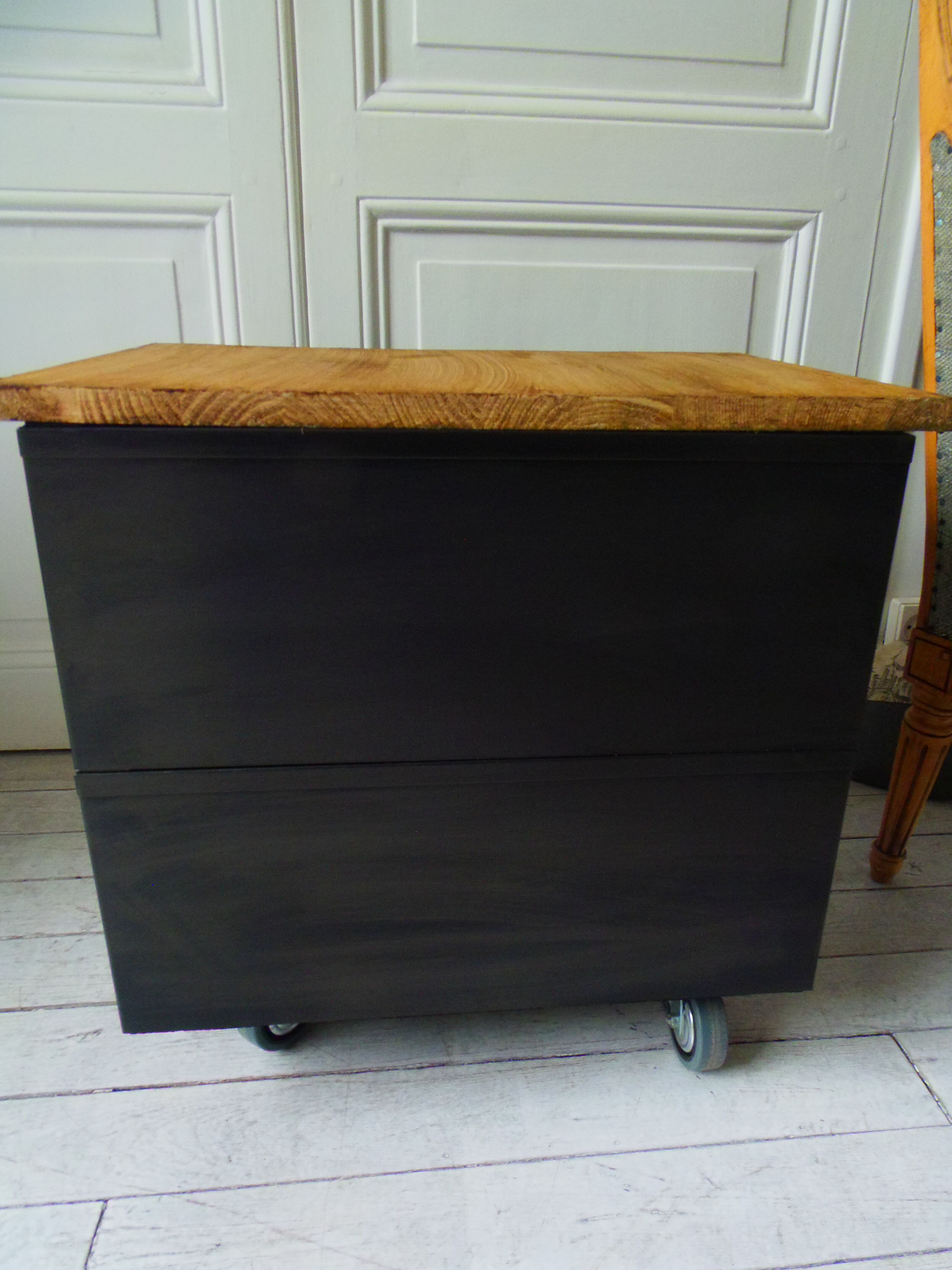 Vintage furniture with metal plugs on black wheels wooden tray