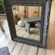 Antique patinated mirror
