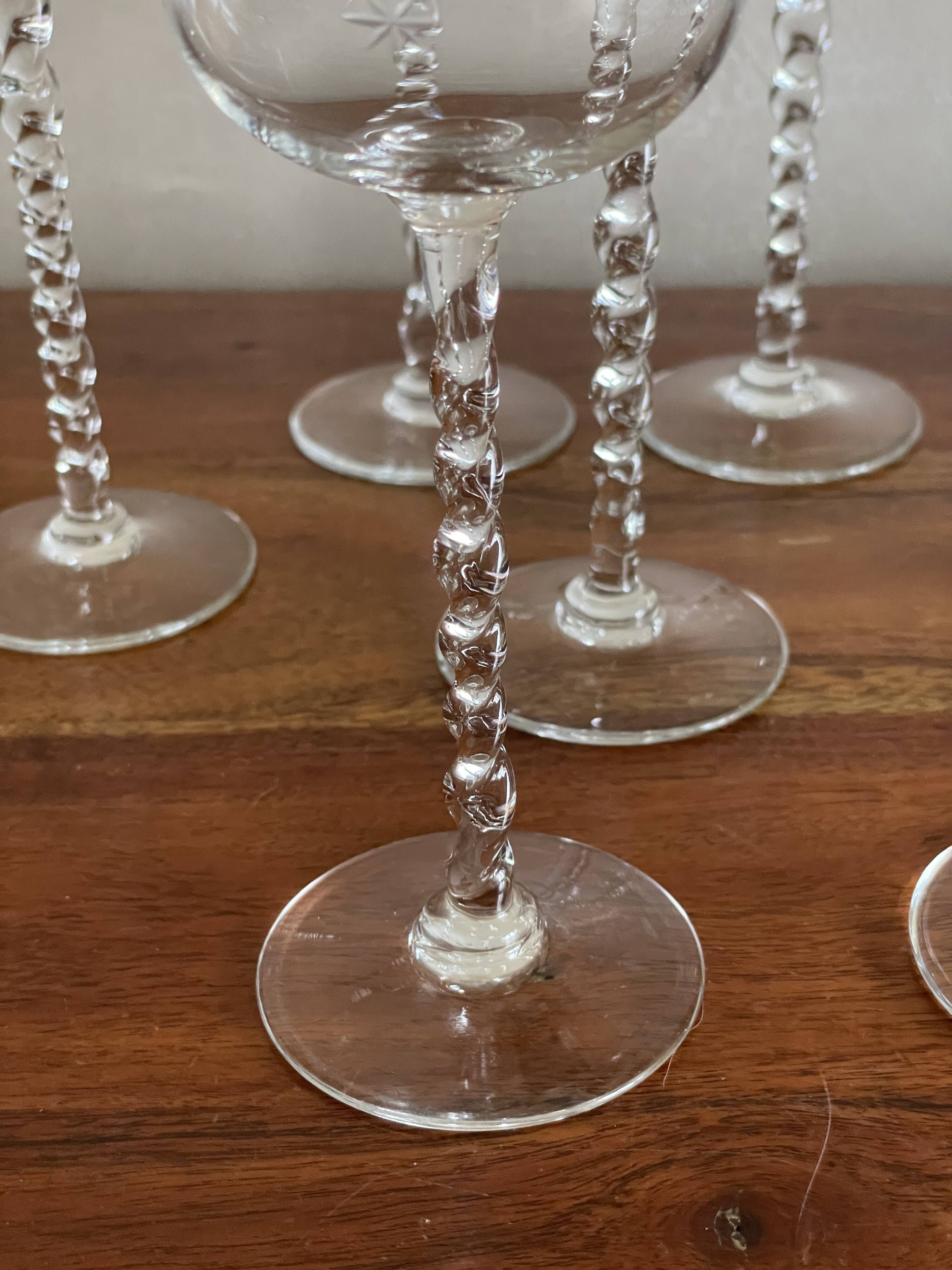 8 glasses with twisted stem and star pattern
