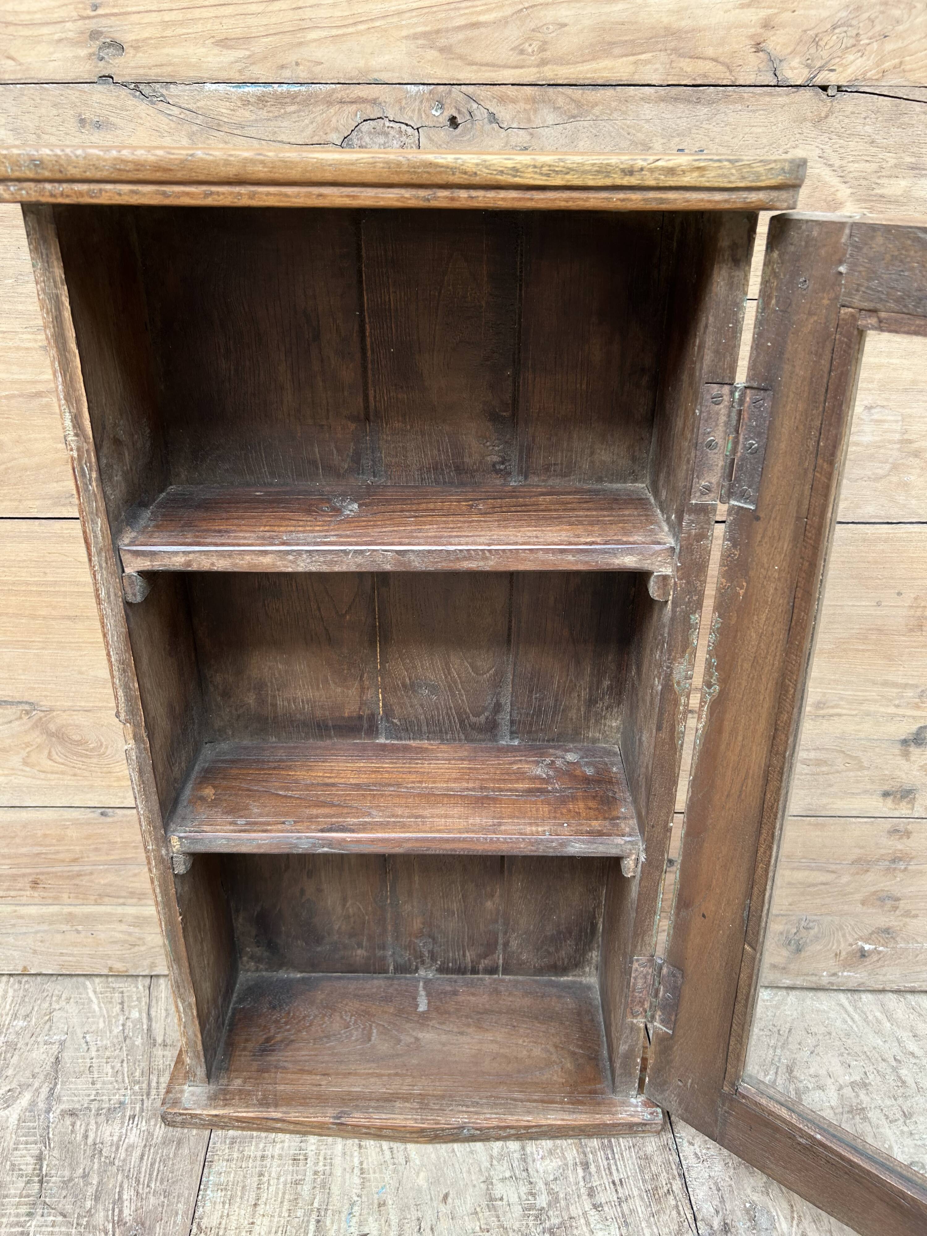 Wall display cabinet in Burmese teak