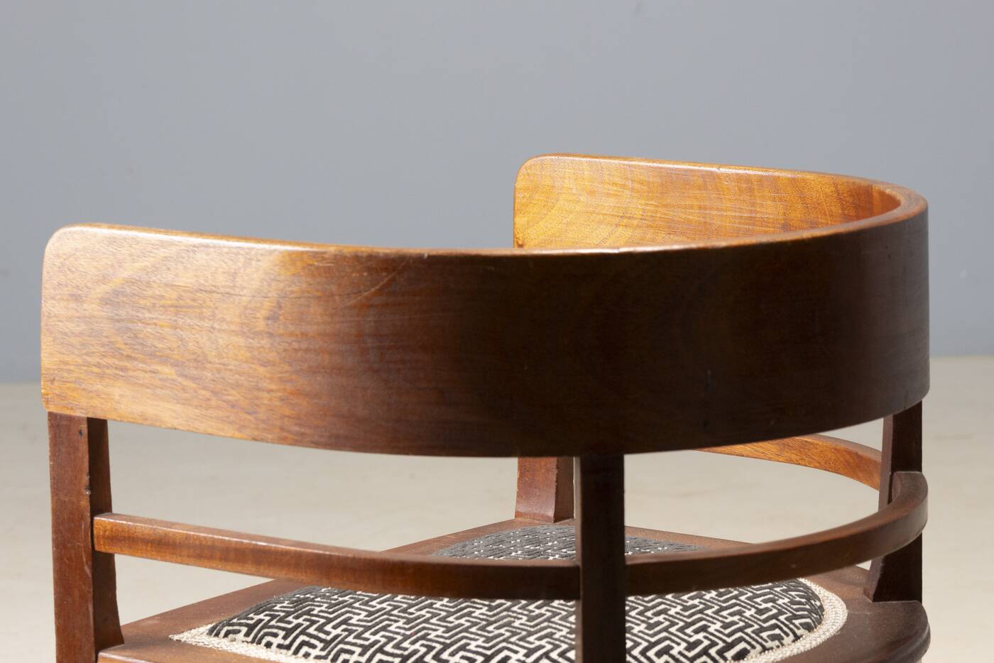 Central European armchair from the early 20th century with an inlaid backrest.