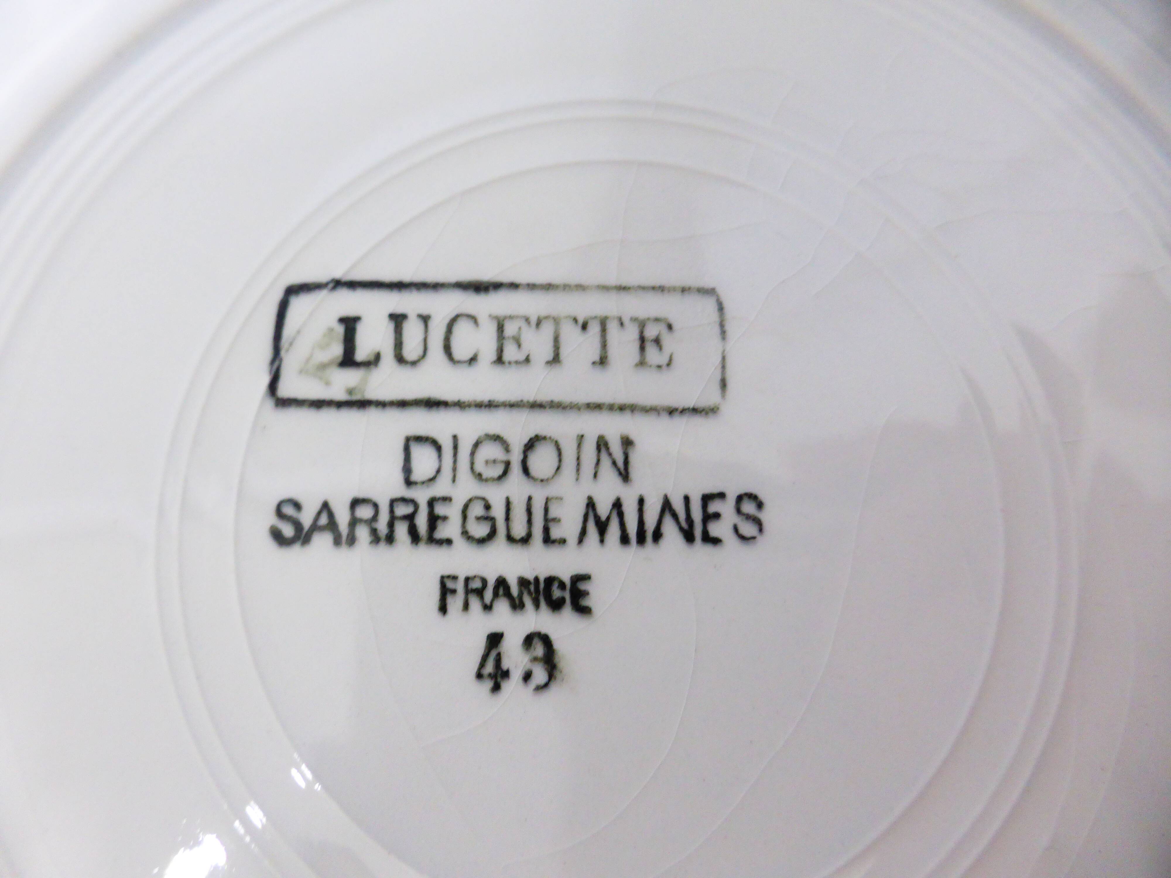 3 vintage soup plates in a jumble