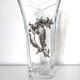 Glass vase with metal flower application
