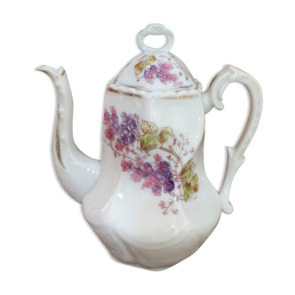 Old porcelain coffee maker or teapot