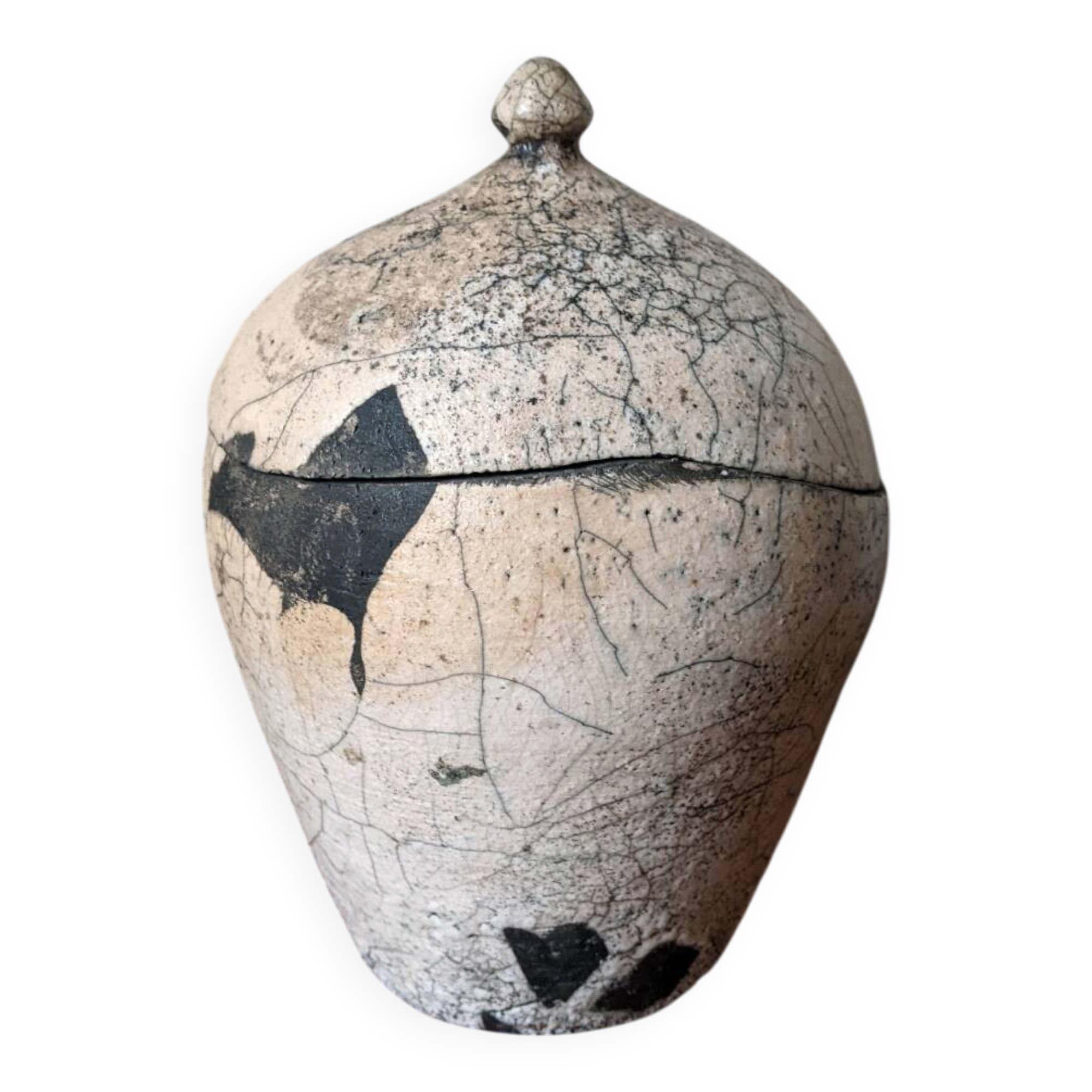 Handmade raku ceramic pot in contemporary Japandi design.