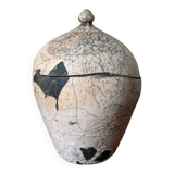 Handmade raku ceramic pot in contemporary Japandi design.