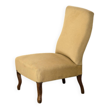 Pale yellow Napoleon III armchair