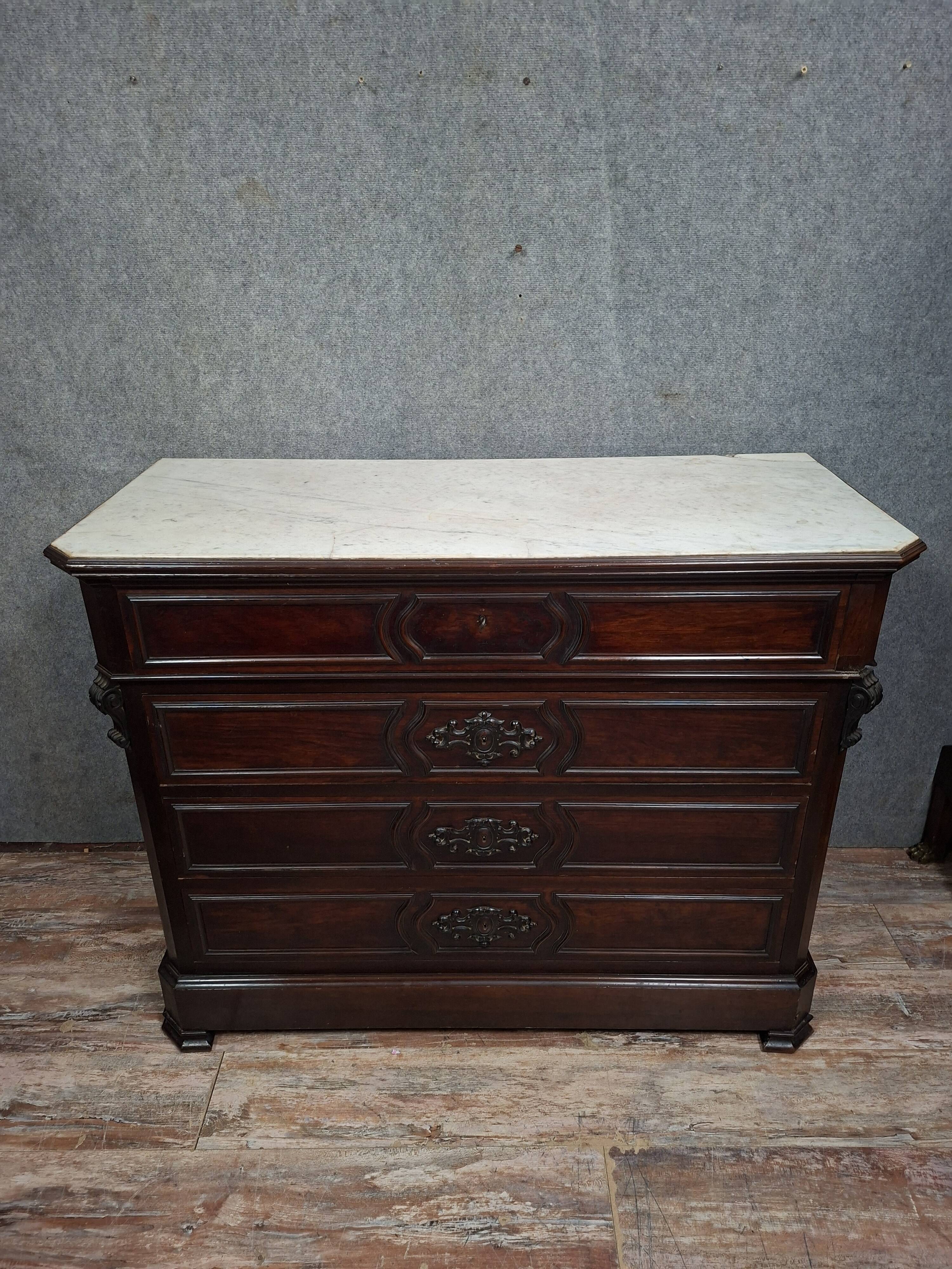 Napoleon III period secretary chest of drawers in mahogany and light wood.