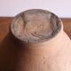 Old glazed terracotta olive jar