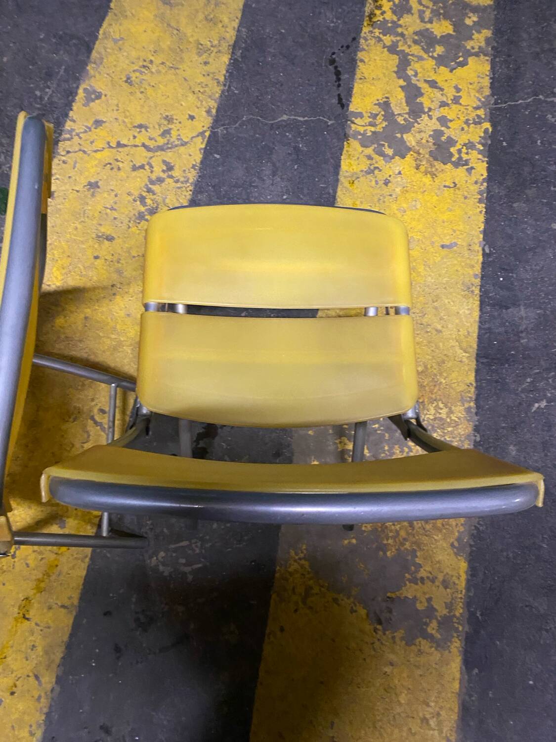 Yellow plastic and steel folding chairs, 1970s