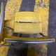 Yellow plastic and steel folding chairs, 1970s