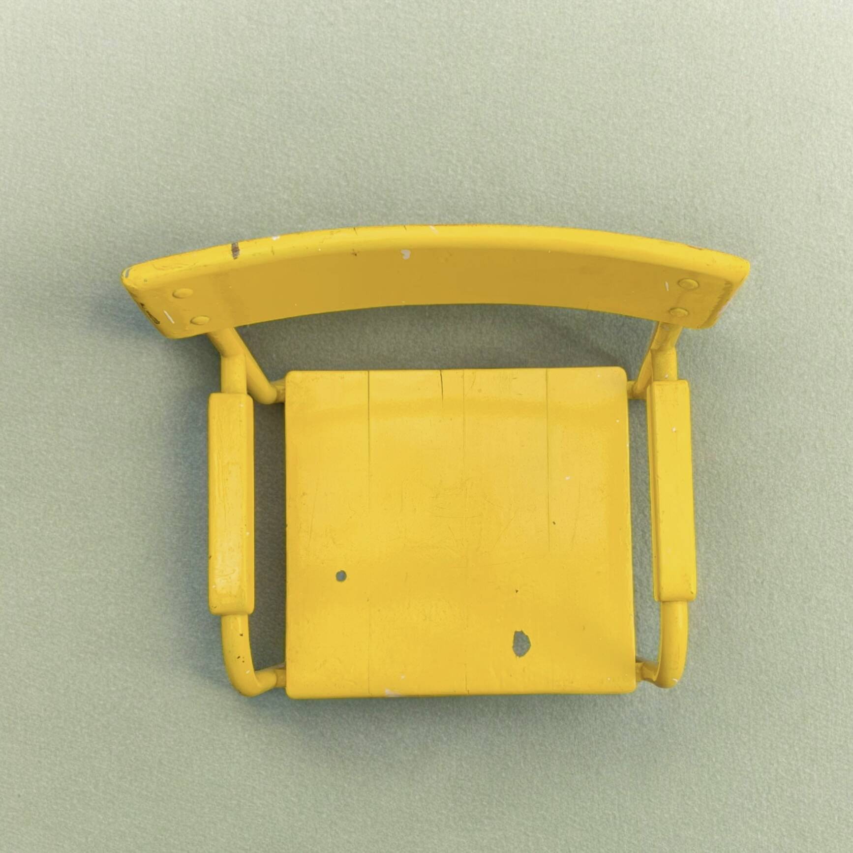 Vintage children's chair in yellow painted wood and metal