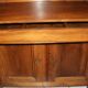 Sideboard with half-columns in walnut, Empire period.