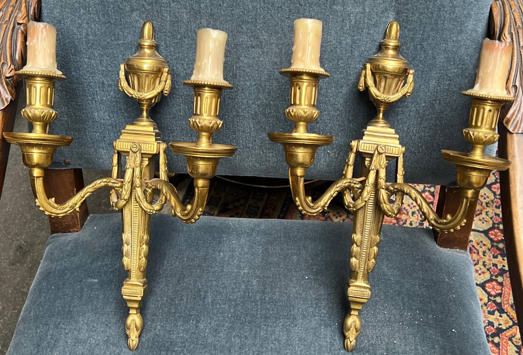 Pair of wall lights. Solid gilded bronze.