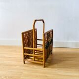 Vintage rattan magazine holder with floral decoration