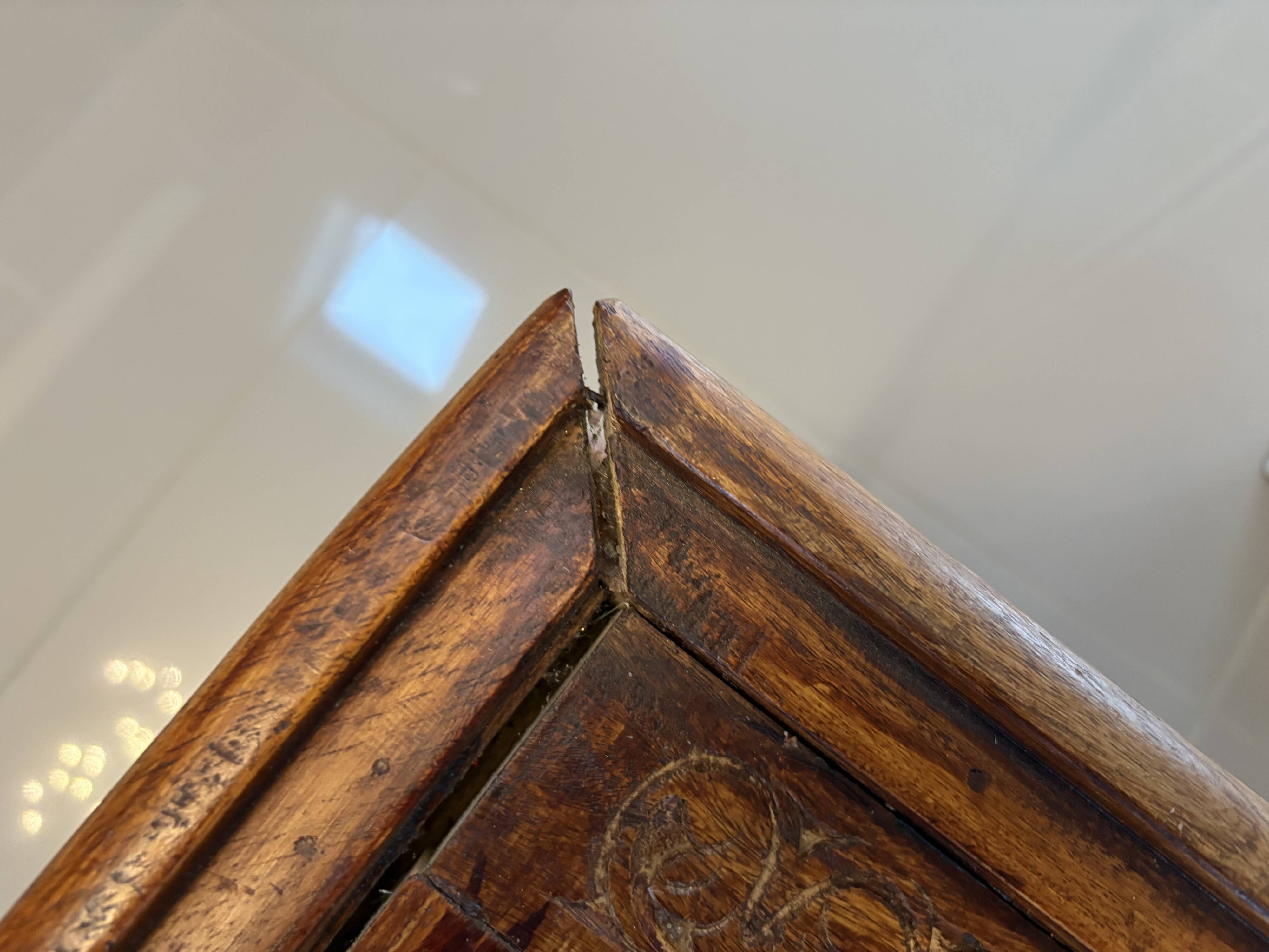 Solid oak carved coffee table with glass top
