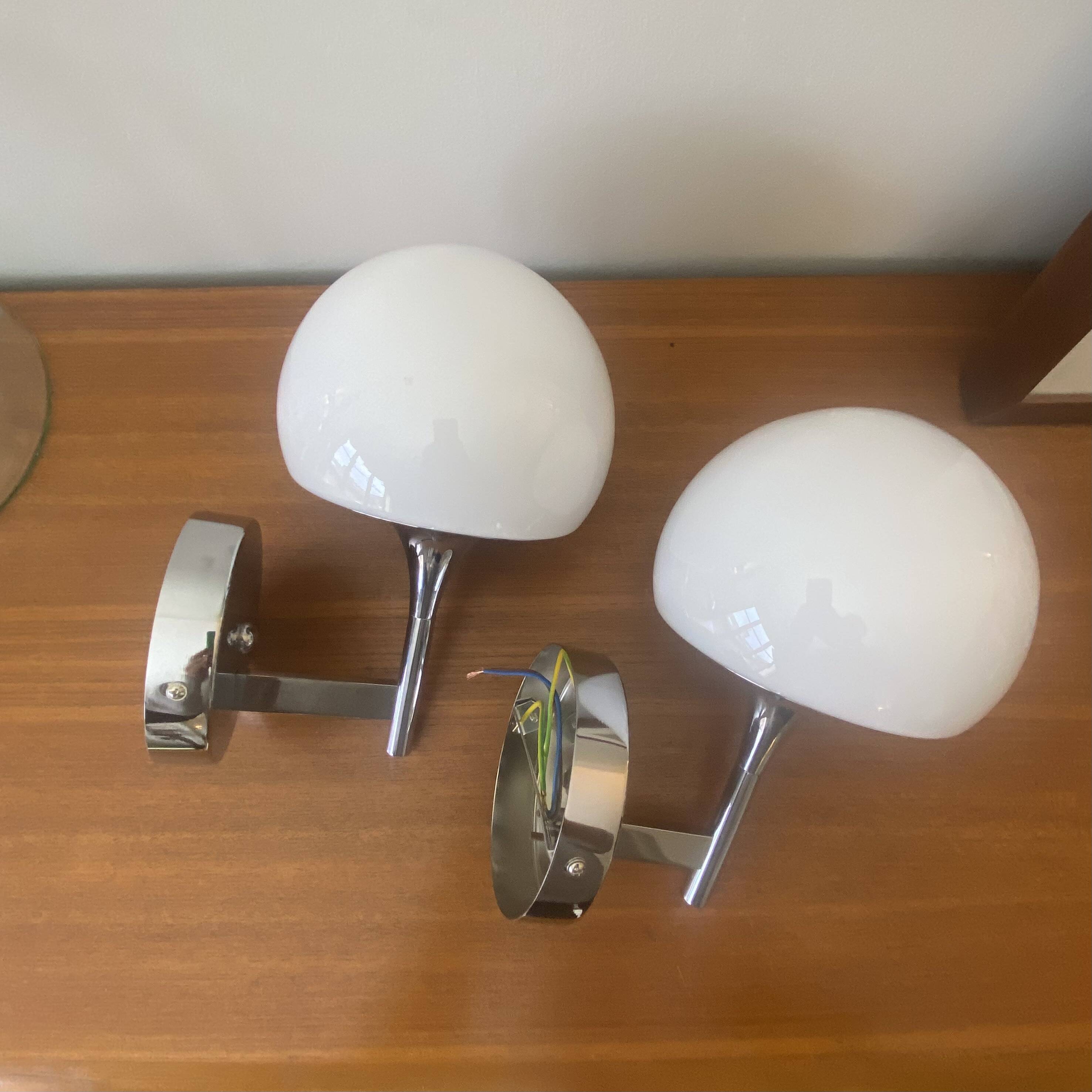 Pair of seventies wall sconces with chrome metal and opaline glass globe.
