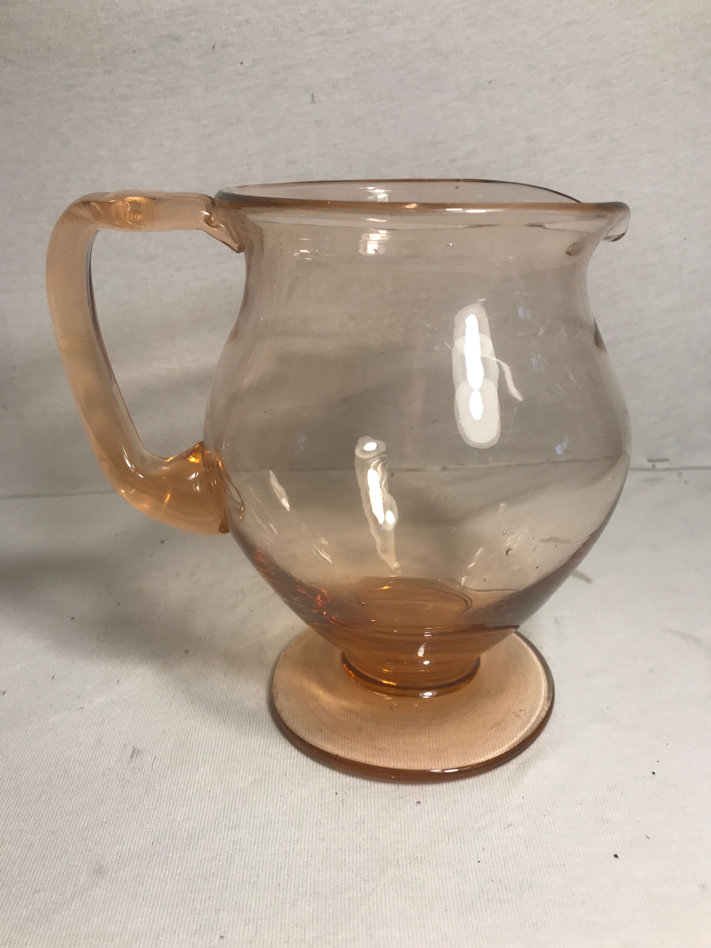 Pink pitcher in bubble glass