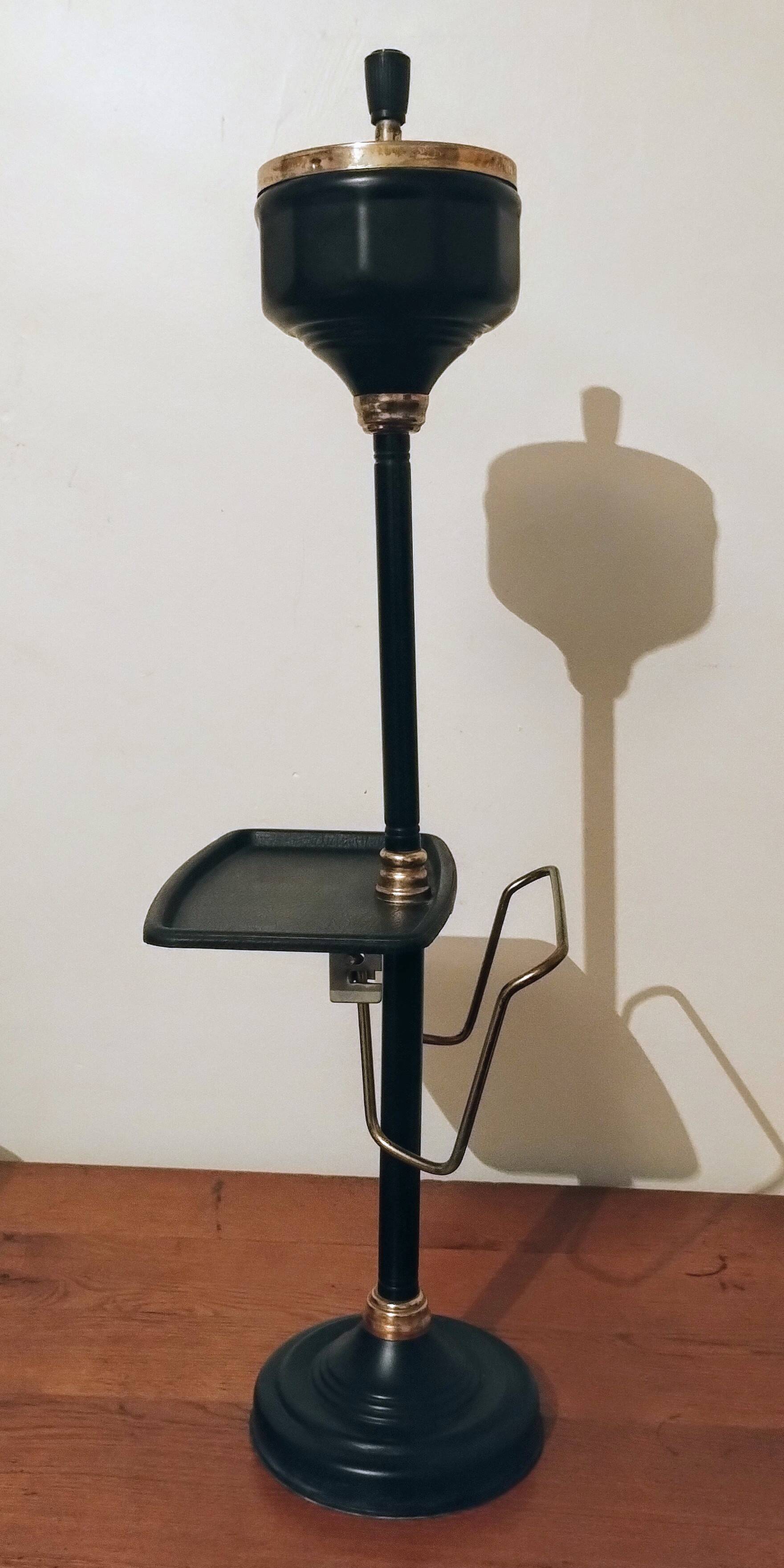 Black and gold ashtray magazine holder, mid-20th century
